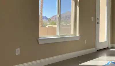 Professional interior trim painting with crisp edges and detail in a Phoenix, AZ home