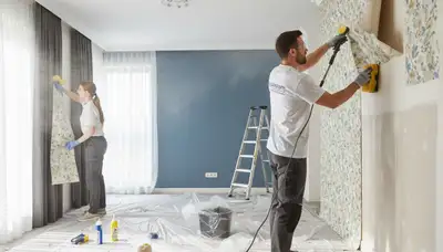 Professional wallpaper removal service in Phoenix, AZ preparing walls for fresh interior painting